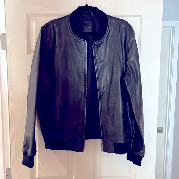 Hard leather members style jacket. Lightly worn.